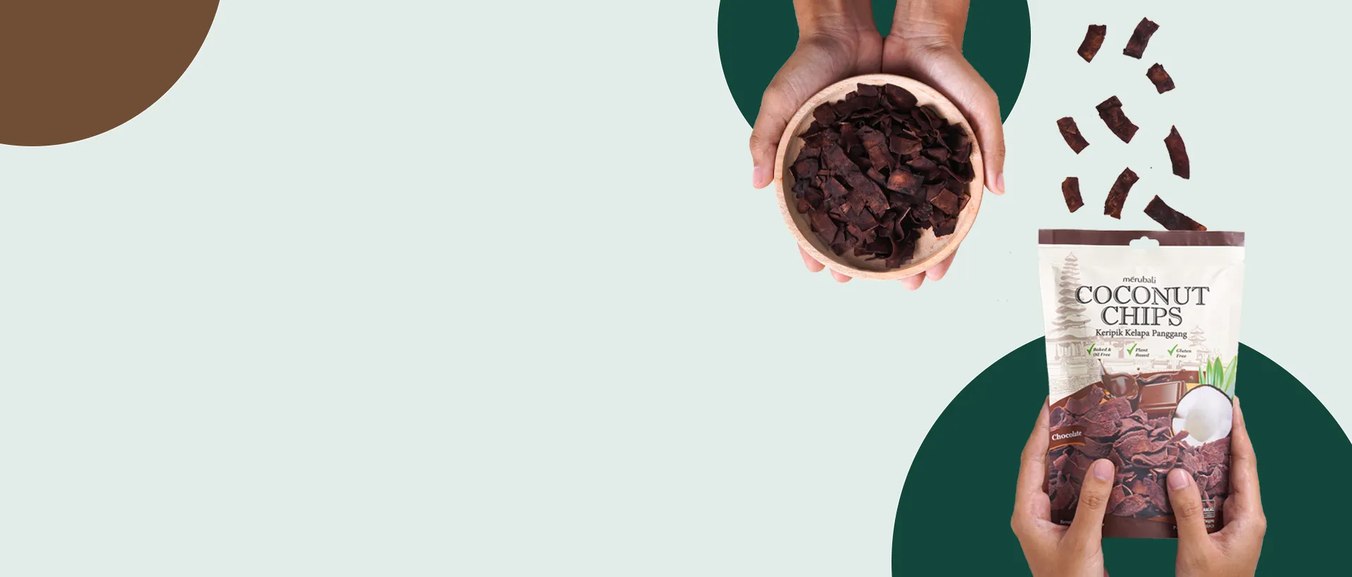 Hands holding a bowl of chocolate coconut chips and a pack of Merubali Coconut Chips